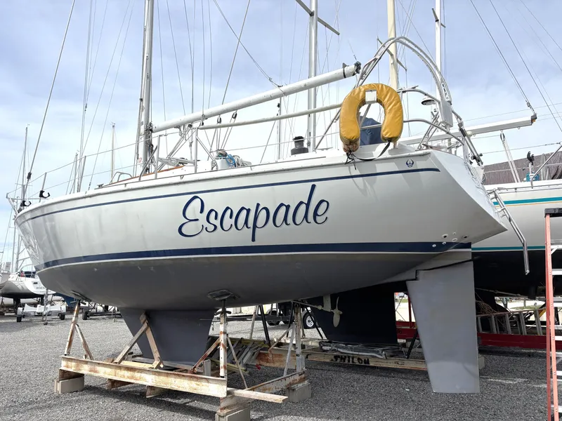 The Image of 1988 Ericson 34-2 sailboat "Escapade" on a dry dock. - 0