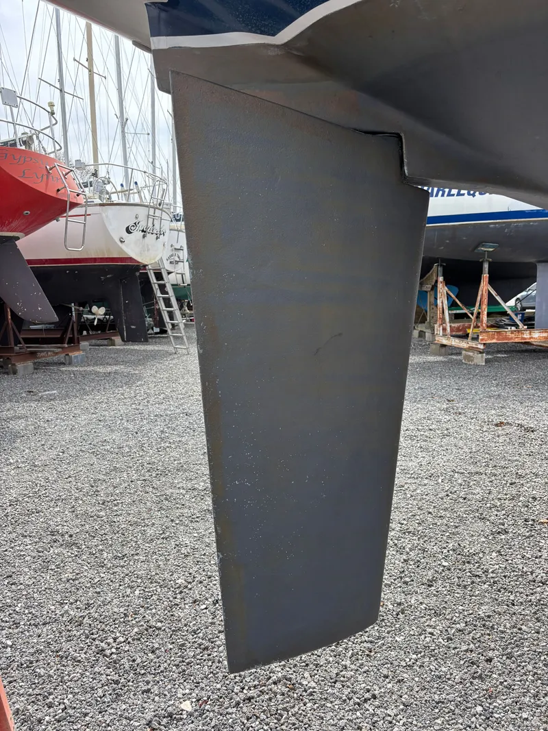 Slide: The Image of Rudder of a 1988 Ericson 34-2 sailboat in dry dock. - 10