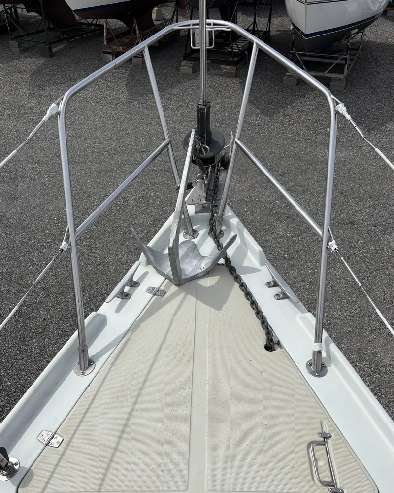 Slide: The Image of 1988 Ericson 34-2 sailboat in harbor with rigging. - 20