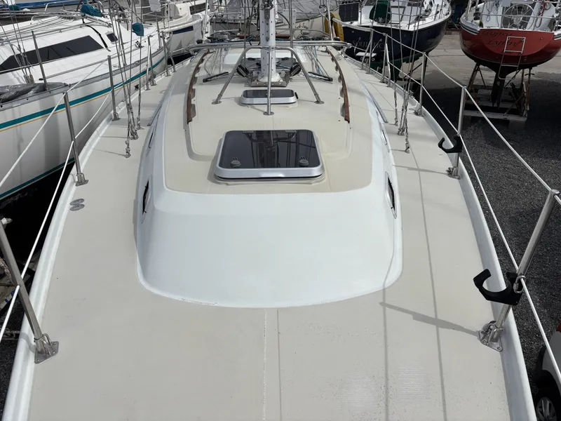 Slide: The Image of Deck of a 1988 Ericson 34-2 sailboat in harbor. - 23