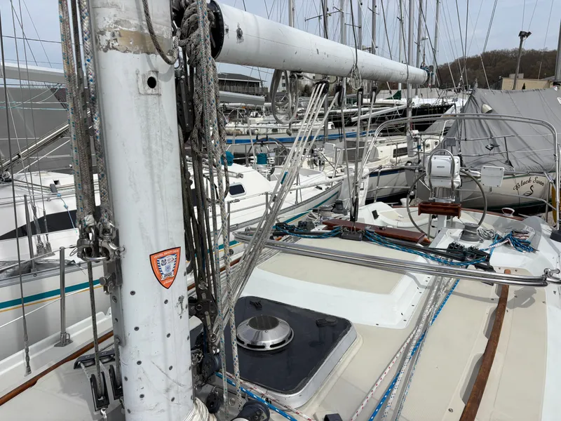 Slide: The Image of Deck of a 1988 Ericson 34-2 sailboat in harbor. - 24