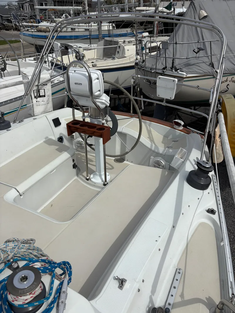 Slide: The Image of Cockpit of a 1988 Ericson 34-2 yacht in a marina. - 28