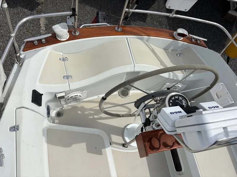 Slide: The Image of Cockpit of a 1988 Ericson 34-2 yacht docked at the marina. - 29