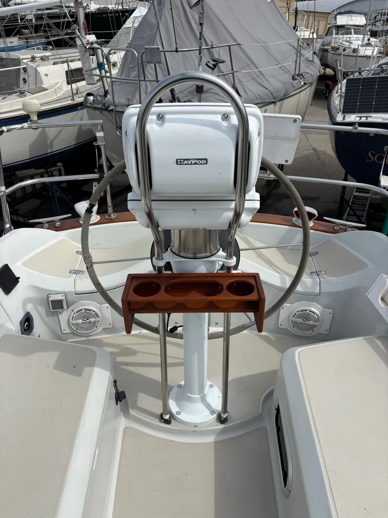 Slide: The Image of Cockpit of a 1988 Ericson 34-2 sailboat with steering wheel and instruments. - 30