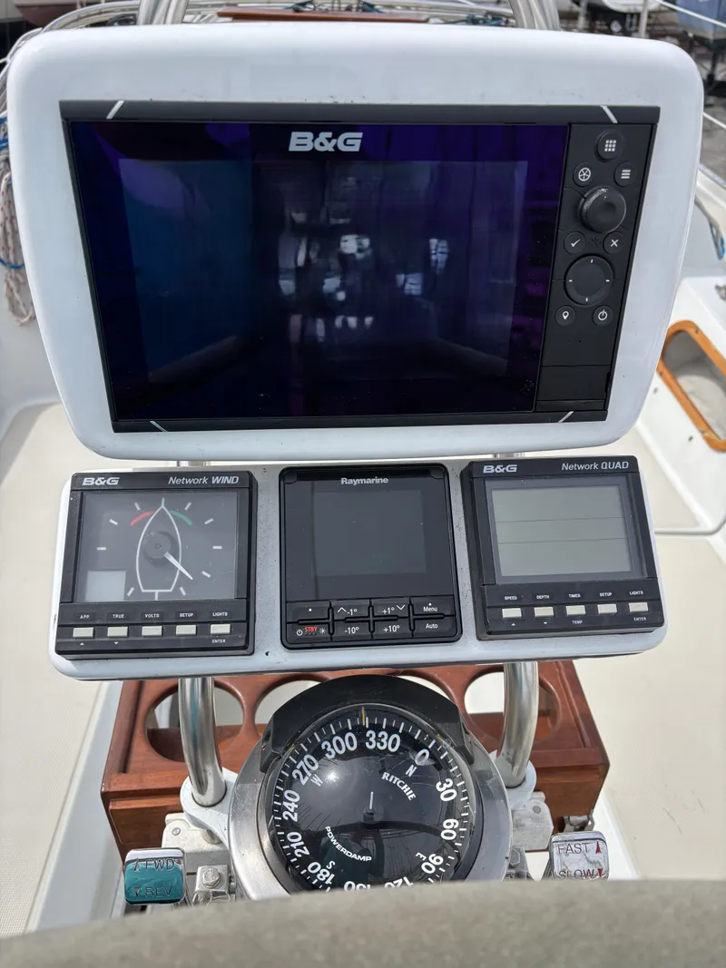 Slide: The Image of Ericson 34-2 1988 boat console with B&G and Raymarine equipment. - 36