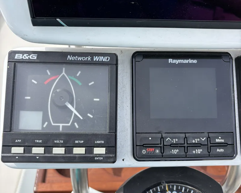 Slide: The Image of 1988 Ericson 34-2 yacht helm with navigation instruments. - 37