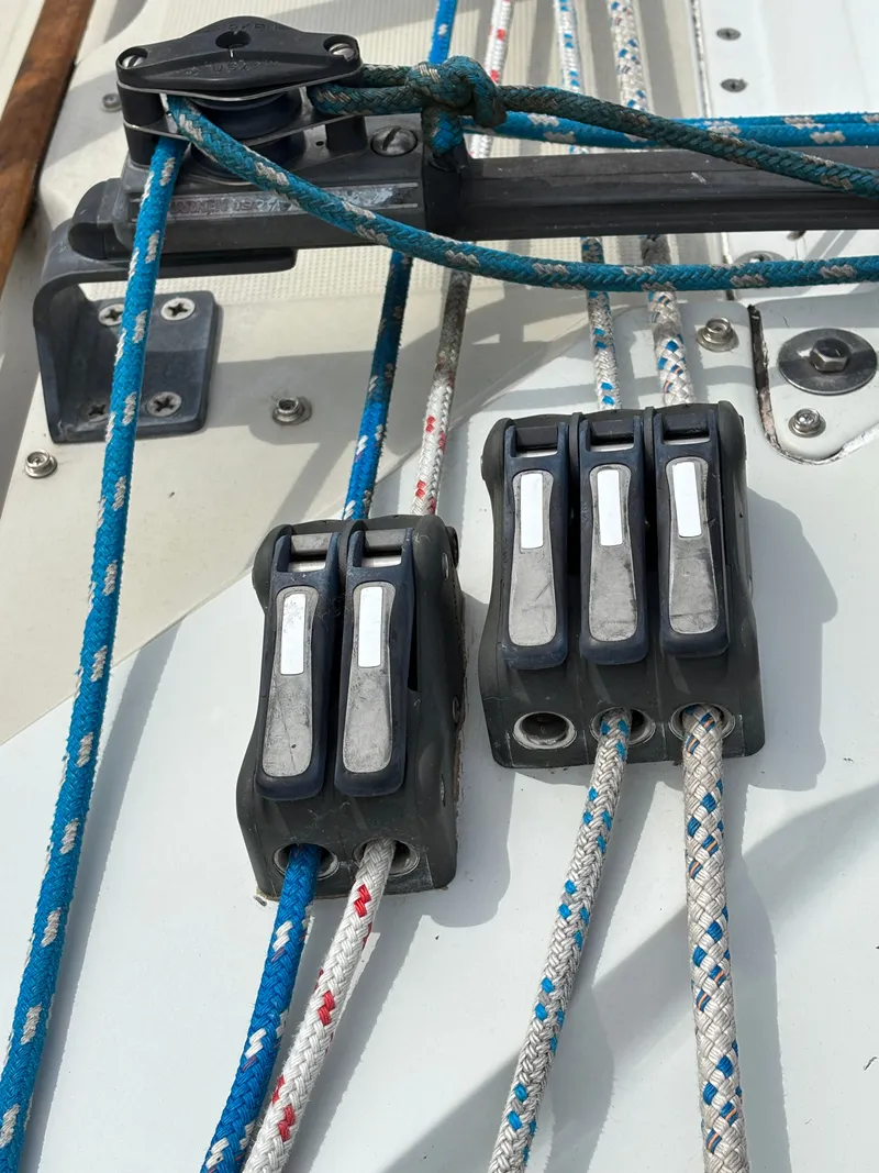 Slide: The Image of 1988 Ericson 34-2 sailboat deck with winches and ropes. - 48