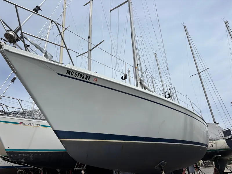 Slide: The Image of 1988 Ericson 34-2 sailboat docked in harbor. - 5