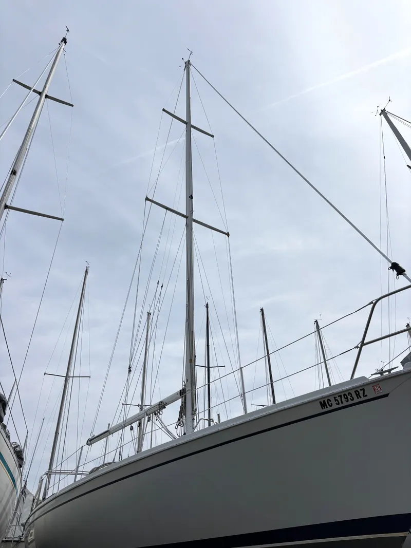 Slide: The Image of 1988 Ericson 34-2 sailboat in dry dock, side view. - 6