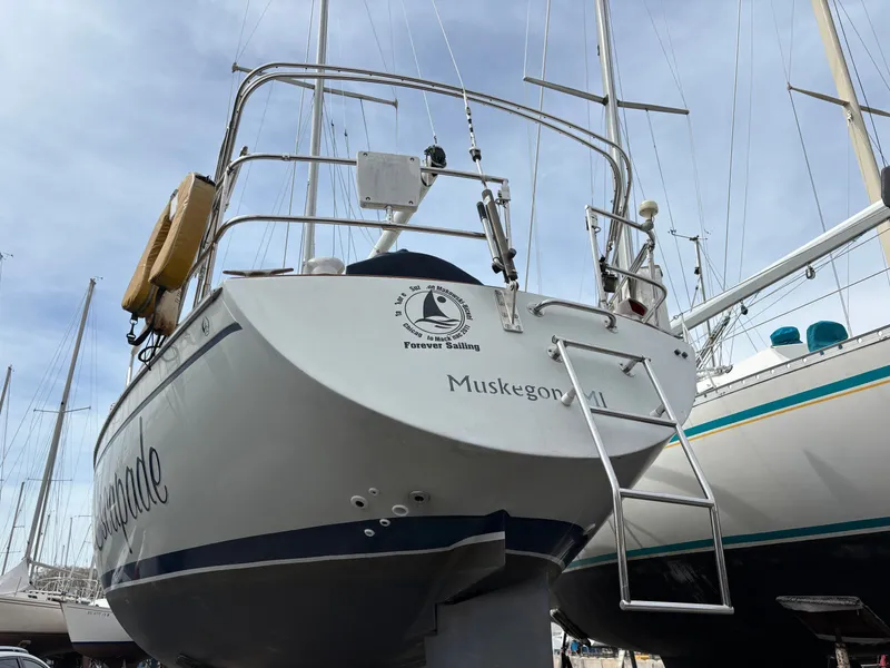 Slide: The Image of 1988 Ericson 34-2 sailboat docked in harbor. - 7