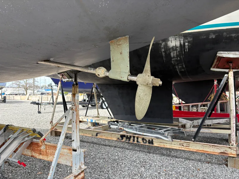 Slide: The Image of Rear view of a 1988 Ericson 34-2 yacht in dry dock. - 8