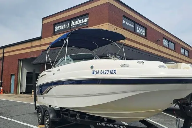 Slide: The Image of 2003 Chaparral Sunesta 236 boat on trailer outside a Yamaha dealership. - 3