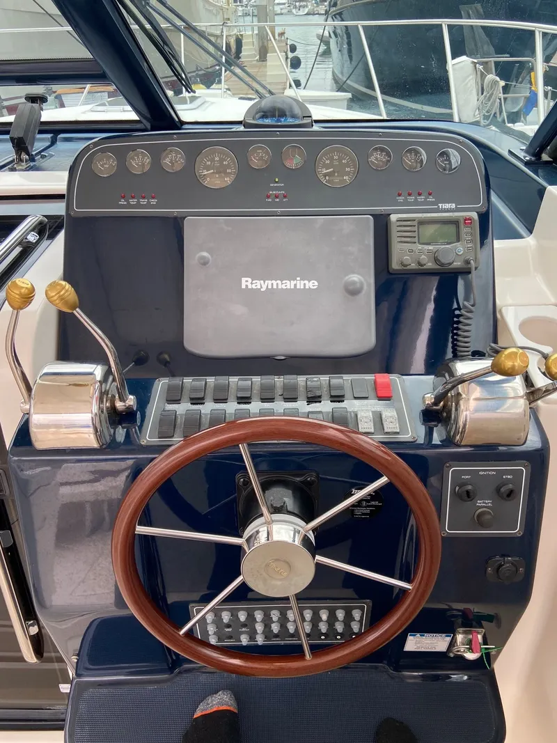 Slide: The Image of Tiara Yachts 32 Open 2005 helm with Raymarine system. - 10