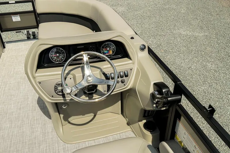 Slide: The Image of 2026 Dockside 22DF boat dashboard with steering wheel and control panel. - 12