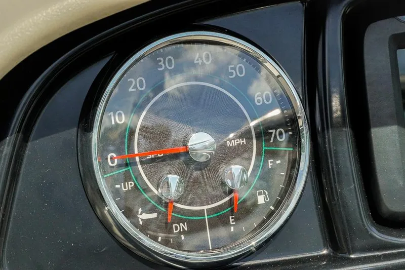Slide: The Image of Dashboard gauge of 2026 Dockside 22DF showing speed and fuel levels. - 13
