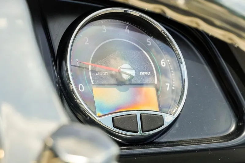 Slide: The Image of Close-up of Dockside 22DF 2026 tachometer displaying RPM gauge. - 14
