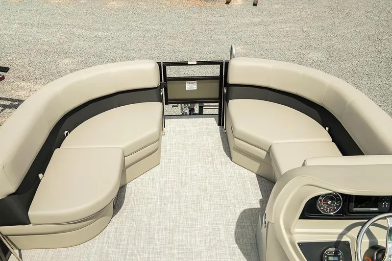 Slide: The Image of 2026 Dockside 22DF pontoon boat with beige seating and modern dashboard. - 21