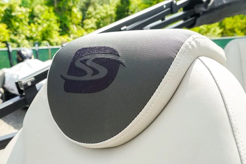 Slide: The Image of Close-up of Dockside 22DF 2026 boat seat with logo, featuring sleek design. - 26