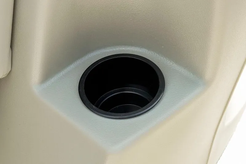 Slide: The Image of Cup holder in 2026 Dockside 22DF boat, beige interior detail. - 29