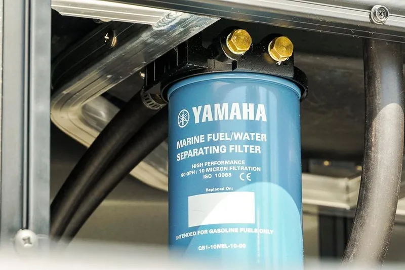 Slide: The Image of Yamaha marine fuel/water separating filter in Dockside 22DF, 2026 model boat engine. - 33