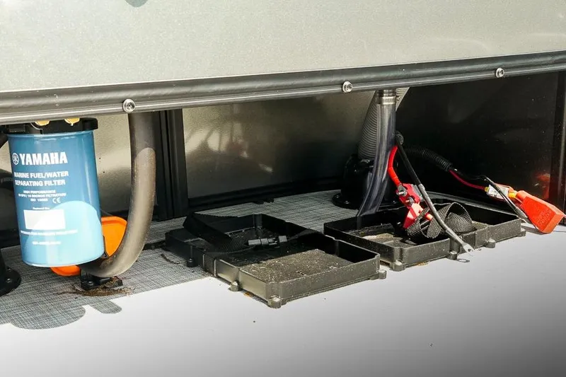 Slide: The Image of 2026 Dockside 22DF marine fuel filter and battery connections, featuring Yamaha components. - 34