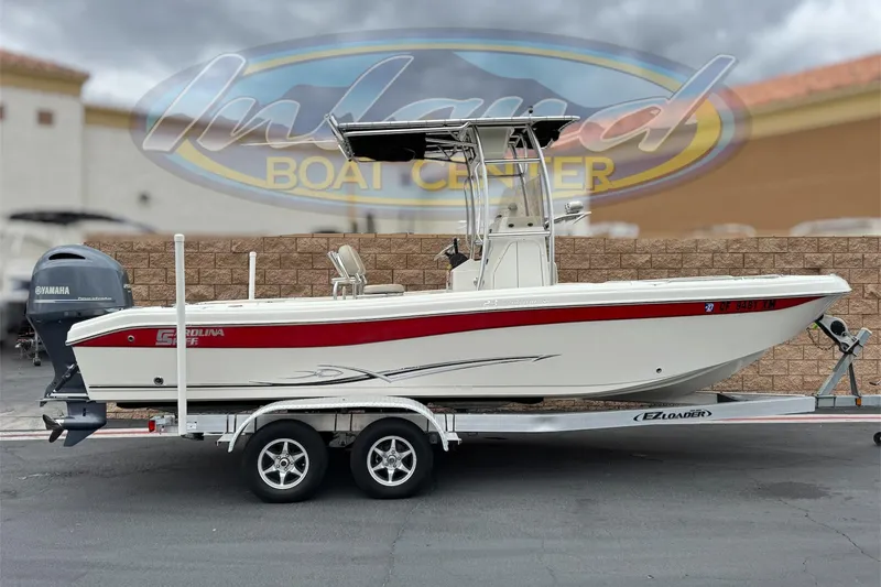 The Image of 2014 Carolina Skiff 23 Ultra Elite SS boat on trailer at Inland Boat Center. - 0