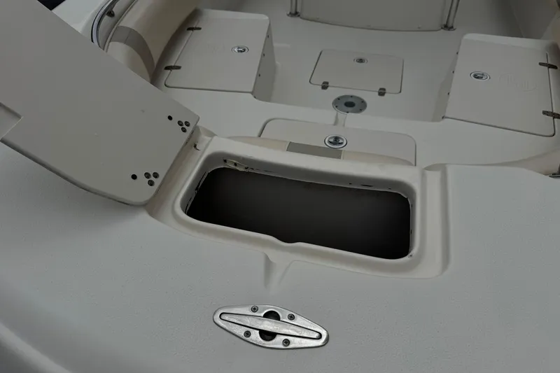 Slide: The Image of 2014 Carolina Skiff 23 Ultra Elite SS boat interior storage compartment. - 11