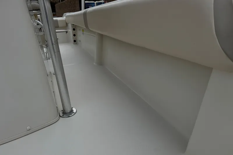 Slide: The Image of 2014 Carolina Skiff 23 Ultra Elite SS interior view, showcasing seating and deck details. - 14