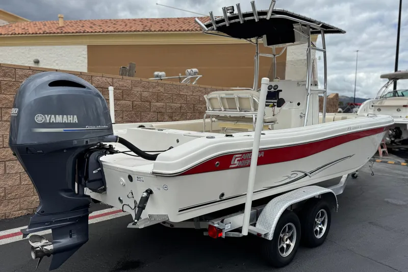Slide: The Image of 2014 Carolina Skiff 23 Ultra Elite SS boat with Yamaha outboard motor on trailer. - 5