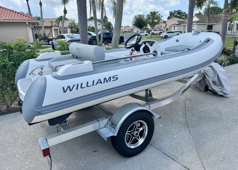 Slide: The Image of 2025 Williams Jet Tenders Sportjet 395 on a trailer. - 1