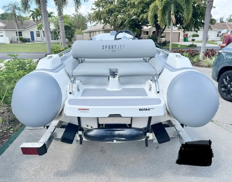 Slide: The Image of Williams Jet Tenders Sportjet 395, 2025, parked on a trailer. - 5