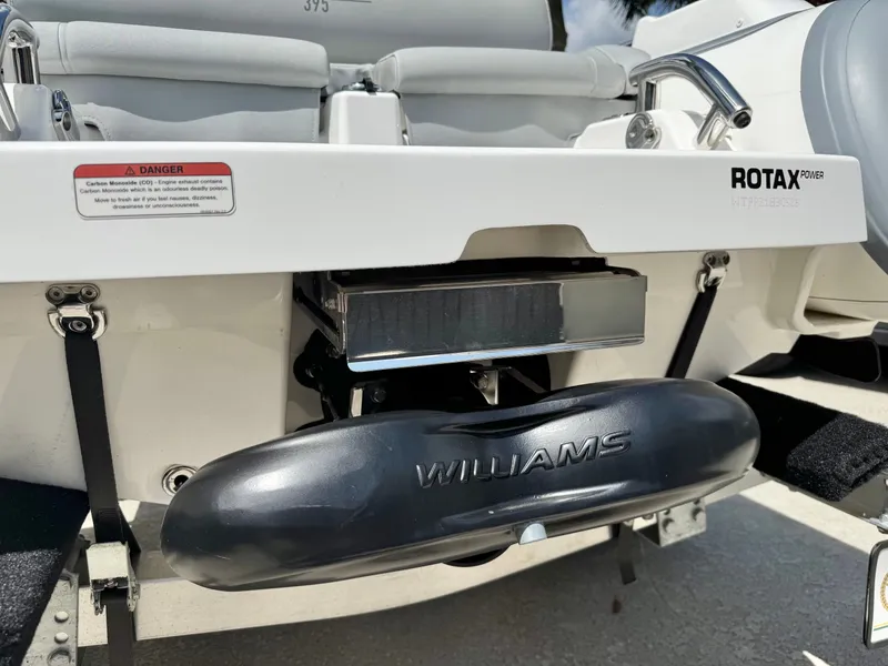 Slide: The Image of Williams Jet Tenders Sportjet 395, 2025, featuring Rotax engine. - 8