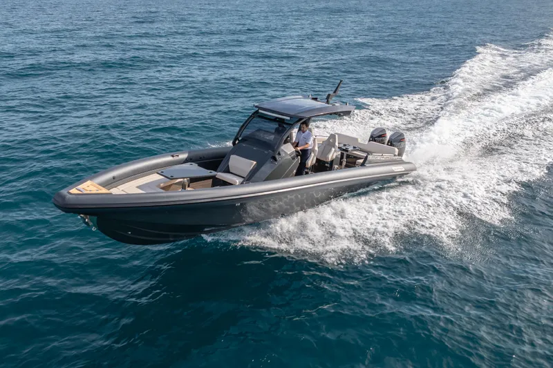 The Image of 2024 Skipper-BSK 38NC boat cruising on open water, showcasing sleek design and powerful performance. - 0