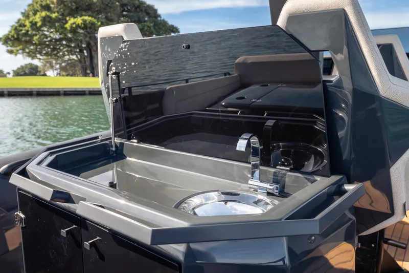 Slide: The Image of Outdoor kitchenette on 2024 Skipper-BSK 38NC boat with sink and faucet. - 10