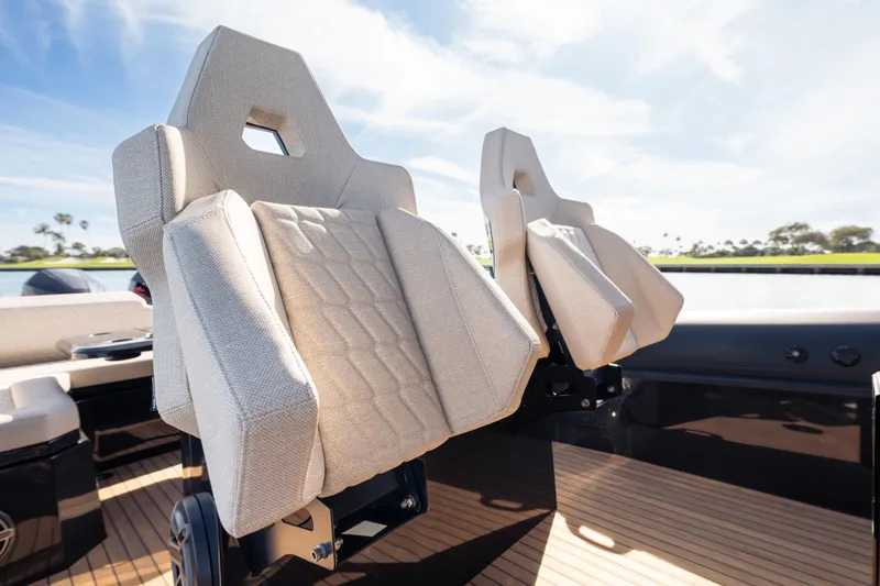 Slide: The Image of 2024 Skipper-BSK 38NC boat seats with modern design and beige upholstery. - 11