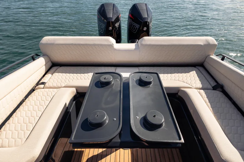 Slide: The Image of Luxurious seating area on 2024 Skipper-BSK 38NC boat with dual engines. - 13