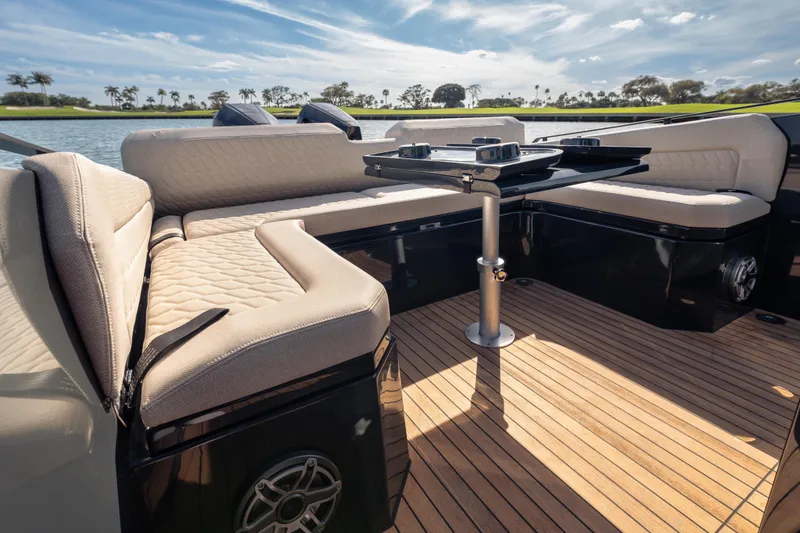 Slide: The Image of Luxurious seating area on 2024 Skipper-BSK 38NC boat with elegant wood flooring. - 14