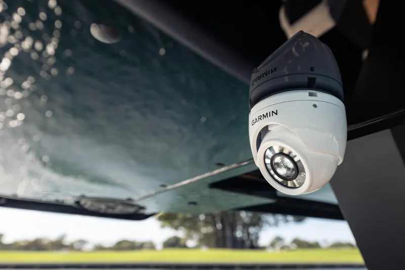 Slide: The Image of Garmin camera mounted on Skipper-BSK 38NC boat, 2024 model, with water reflection. - 15