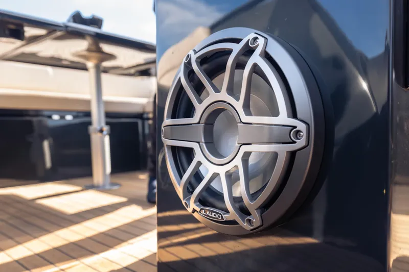 Slide: The Image of Close-up of a marine speaker on a 2024 Skipper-BSK 38NC boat deck. - 16