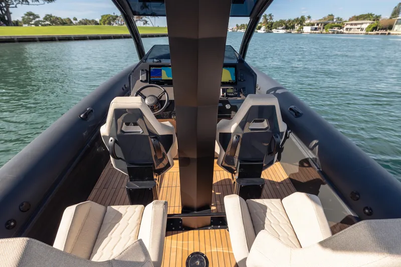 Slide: The Image of Modern 2024 Skipper-BSK 38NC boat interior with sleek design and advanced navigation system. - 8
