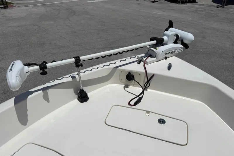 Slide: The Image of 2023 Skeeter SX2350 boat with Minn Kota trolling motor on deck. - 19