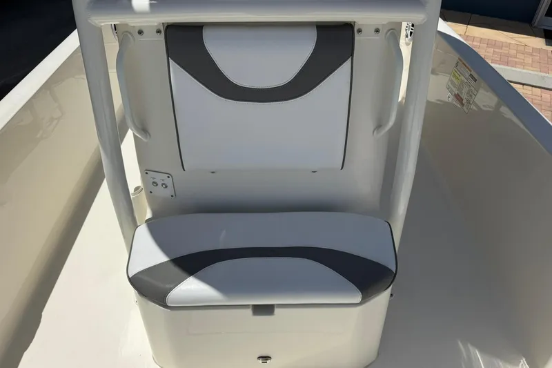 Slide: The Image of 2023 Skeeter SX2350 boat seat with white and gray upholstery, showcasing modern design. - 22