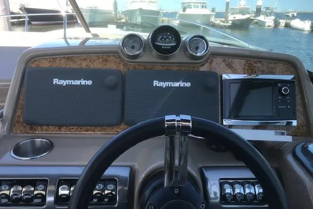 Slide: The Image of Cockpit view of 2015 Formula 350 Sun Sport with Raymarine navigation systems. - 5