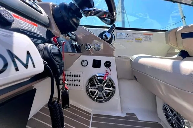 Slide: The Image of Interior view of 2015 Formula 350 Sun Sport boat cockpit with controls and seating. - 29
