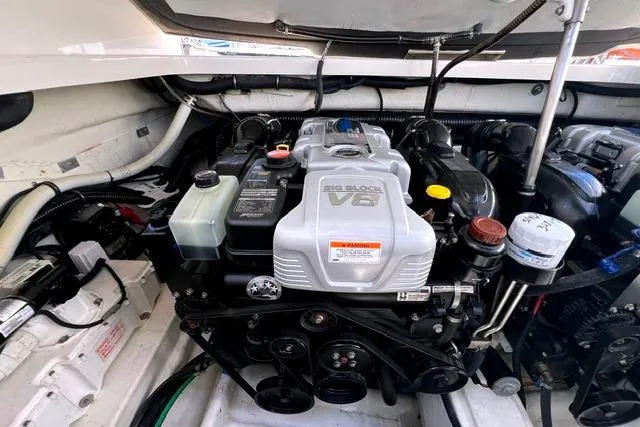 Slide: The Image of Engine compartment of a 2015 Formula 350 Sun Sport boat with a big block V8 engine. - 26