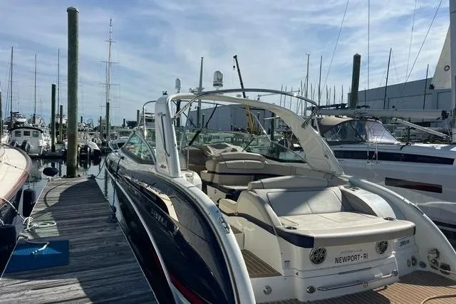 Slide: The Image of 2015 Formula 350 Sun Sport yacht docked at marina under clear sky. - 10
