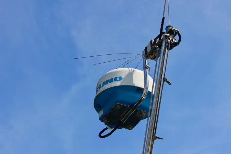 Slide: The Image of Radar equipment on a Freya 39 sailboat mast against a clear blue sky. - 15