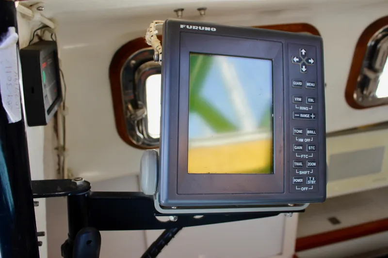 Slide: The Image of Boat navigation system on a 1993 Freya 39 yacht, featuring a Furuno display. - 21