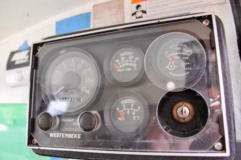 Slide: The Image of Instrument panel of a 1993 Freya 39 boat with Westerbeke gauges. - 24
