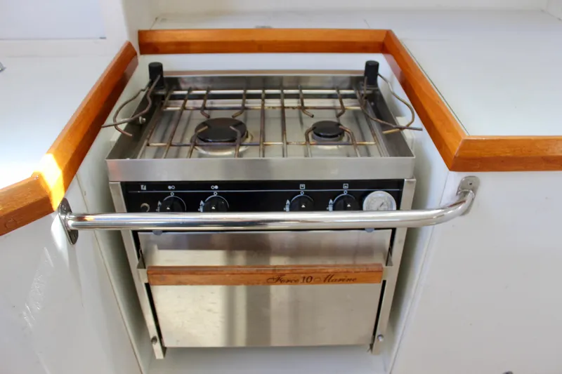 Slide: The Image of Stainless steel marine stove in a 1993 Freya 39 yacht kitchen. - 30